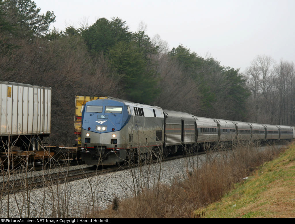 AMTK 150 leads train 80 past train 213